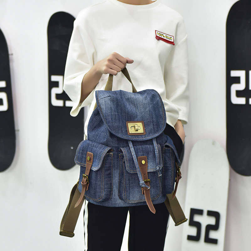新款复古风斜跨洗水牛仔布背包潮流学院风书包休闲潮人旅行双肩包