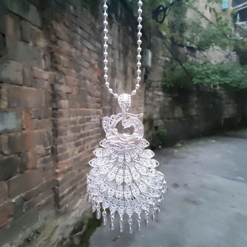 新款民族风拉丝孔雀开屏毛衣链现货杨丽萍夸张式银色凤凰项链饰品