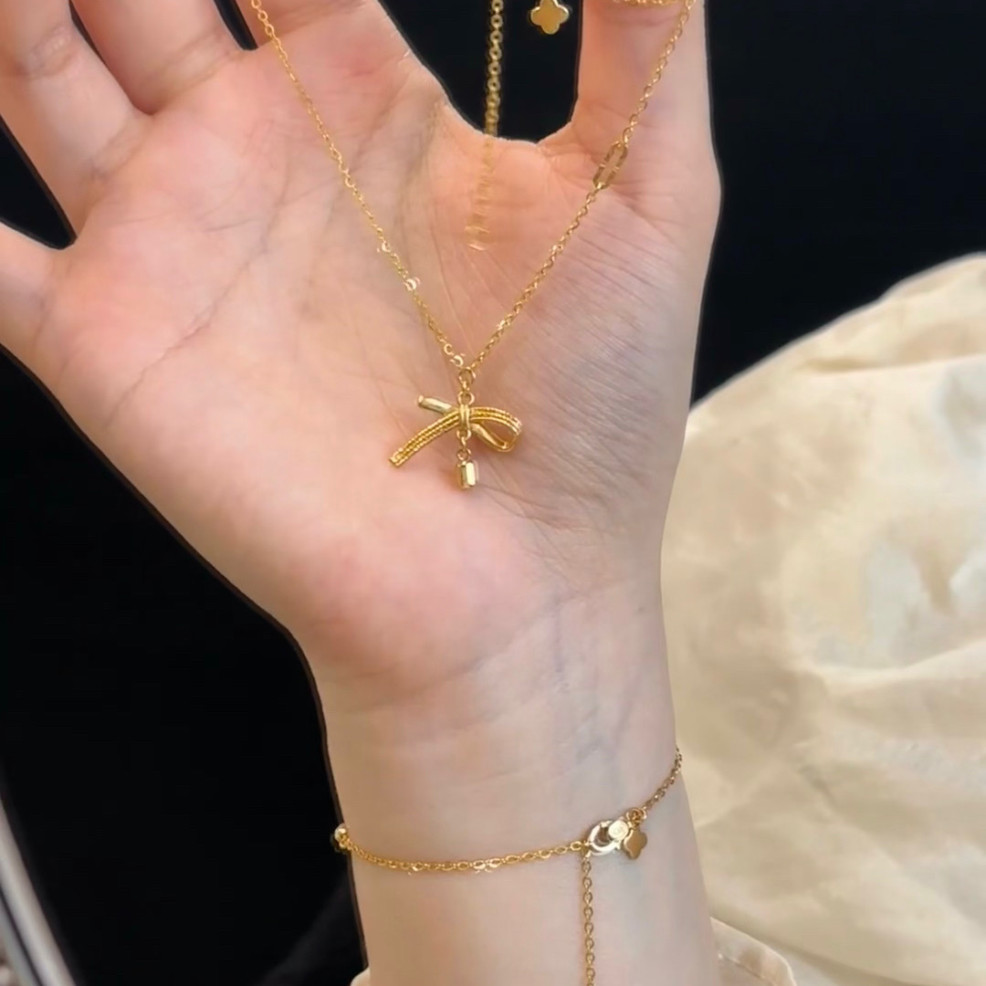丝带蝴蝶结黄金色项链周
