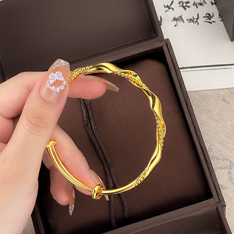 新款纽纹麻花推拉手镯女越南沙金仿真黄金正品实心999莫比乌斯环