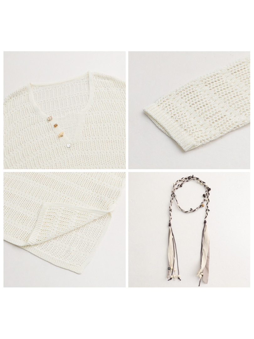 White open-knit cardigan shown flat with braided tie accessory
