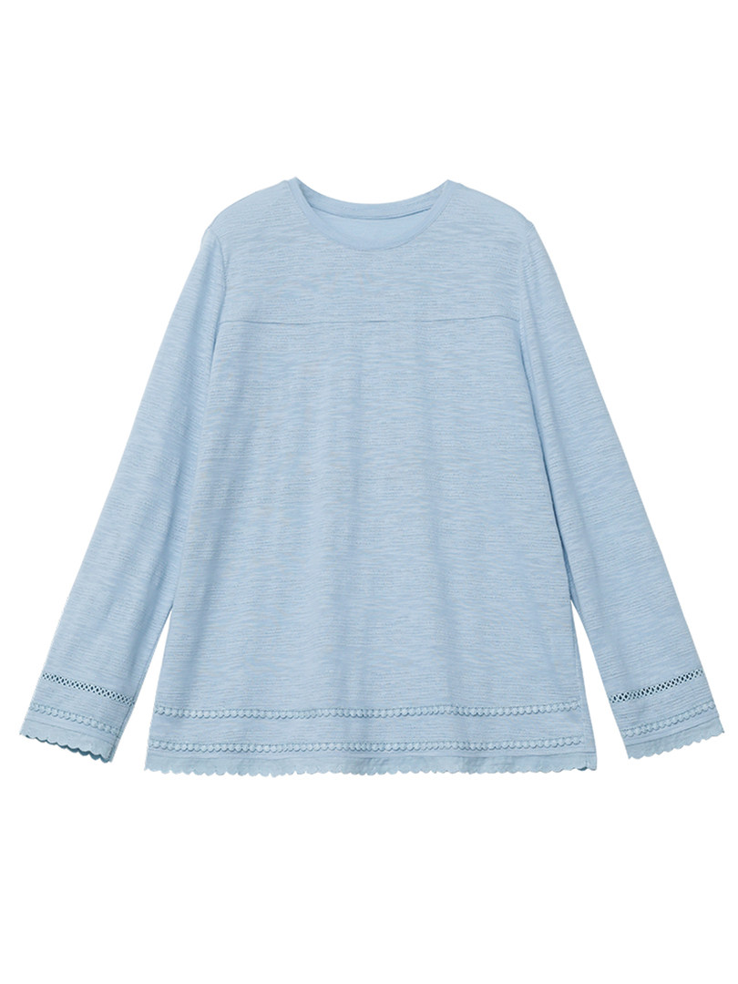 Light blue long-sleeve top laid flat on a white background