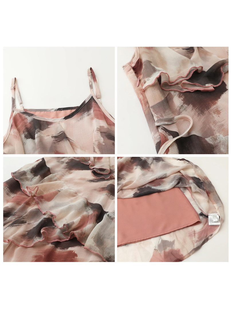 Sheer floral-patterned spaghetti strap camisole laid flat