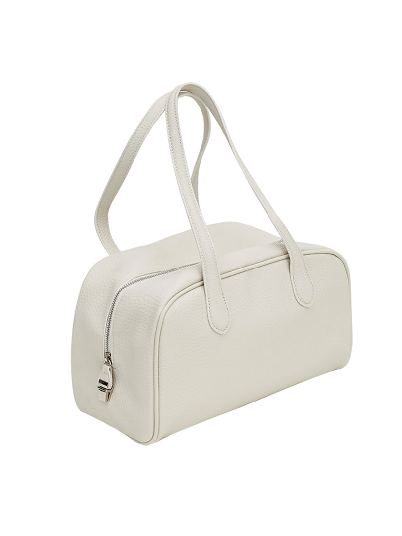White leather handbag with top handles on a plain background