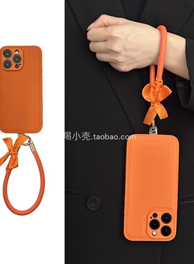 高级感手工丝带蝴蝶结软实心皮质手腕17适用于iphone16promax手机壳爱马仕橙色15pm苹果14挂绳12防摔13/11女