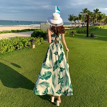 海南三亚沙滩裙女夏季2025新款高端海边度假连衣裙氛围感吊带长裙