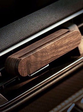 Wooden car-mounted mosquito repellent and air freshener.
