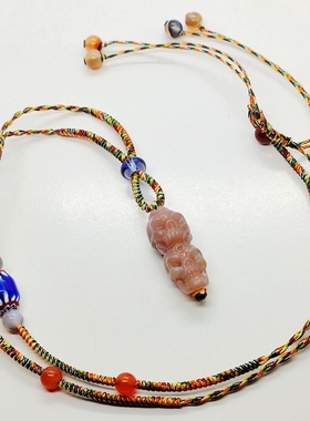 西藏天珠雕刻满朱砂骷髅原创吊坠