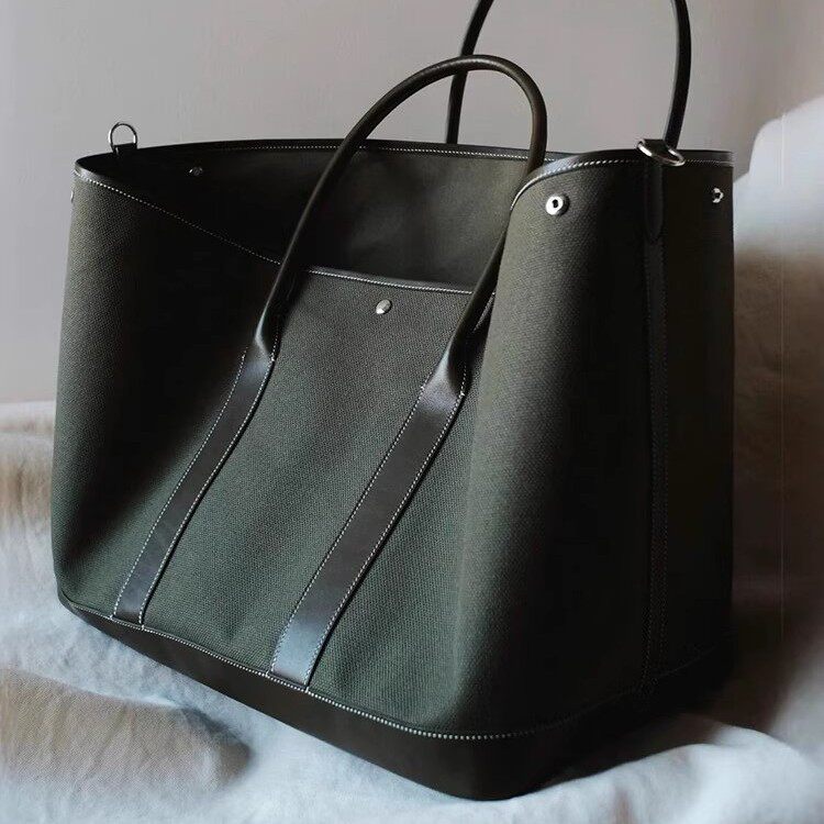 PU帆布大容量托特花园包包女2026新款高级感通勤手提单肩斜挎包