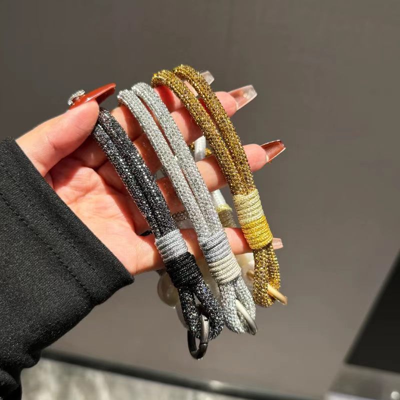 高级感闪钻编织珍珠手机手腕绳简约小众腕链钥匙扣手机装饰配件