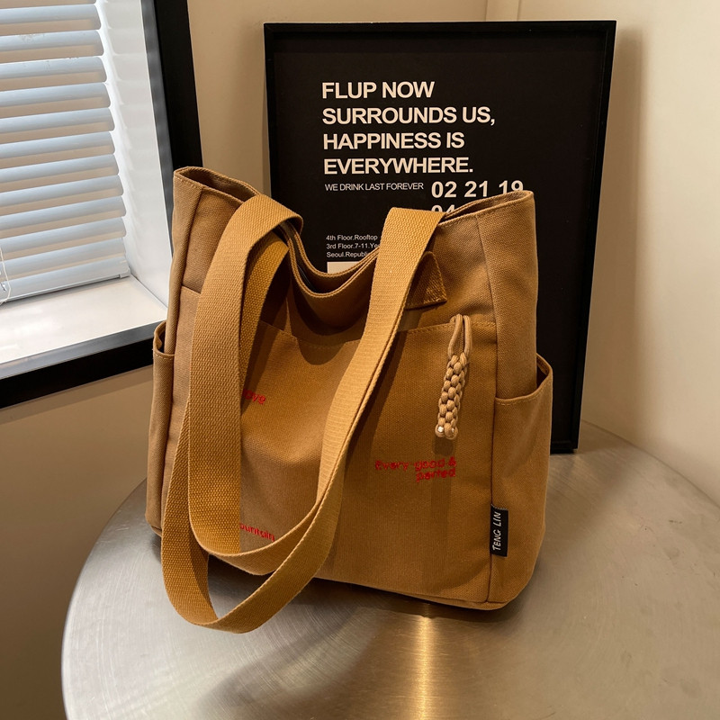 休闲大容量帆布包包女2024新款时尚简约百搭学生上课手提通勤包,箱包皮具/热销女包/男包,时尚帆布包,淘宝优惠券,粉丝福利购,淘宝优惠卷