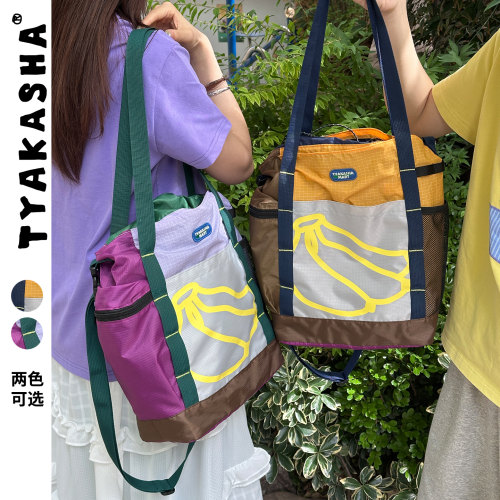 TYAKASHA塔卡沙包包2026夏季新款大容量通勤拼色手提包单肩包