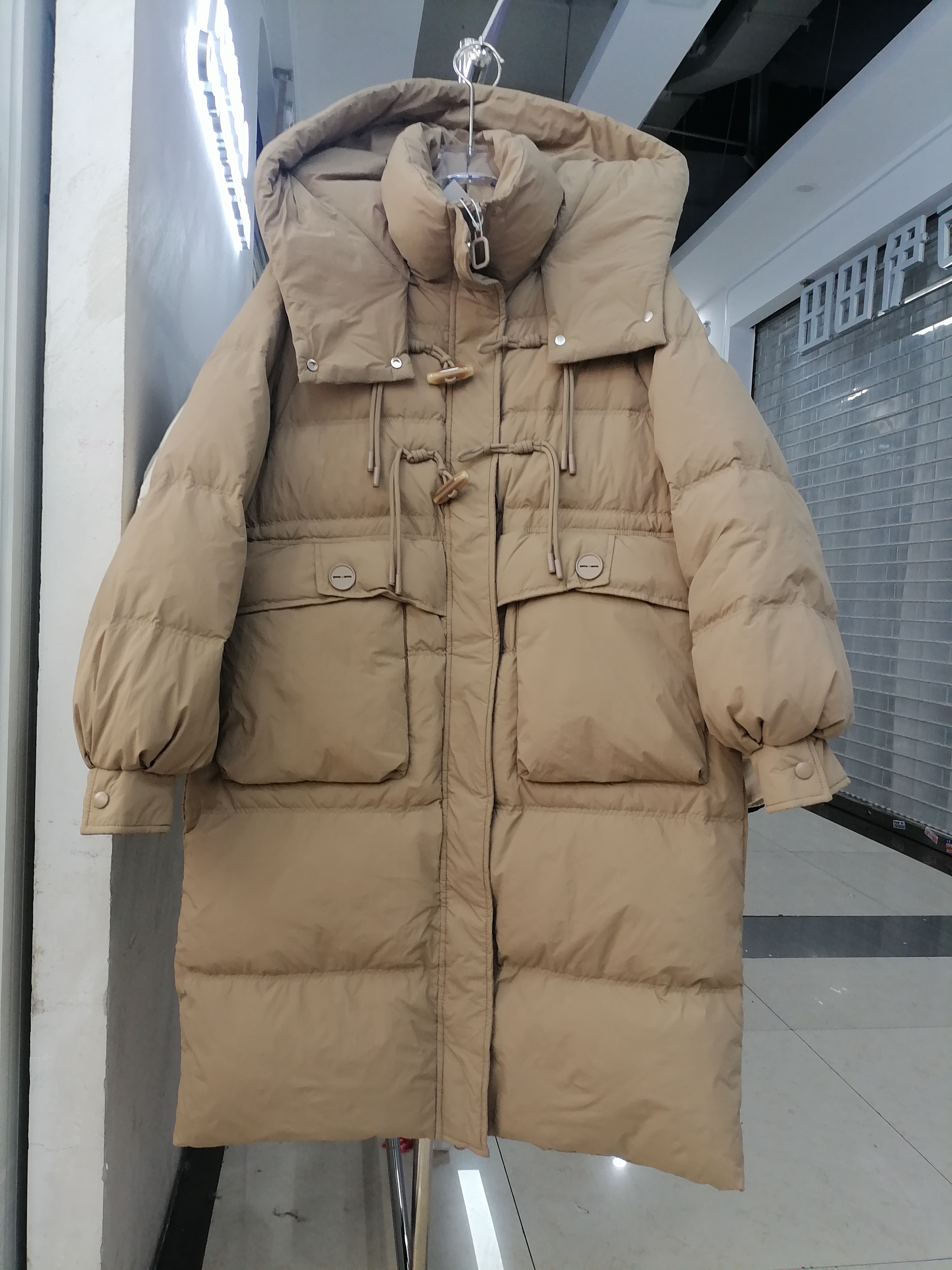 欧洲站2025冬季 90白鸭绒羽绒服女中长款连帽休闲宽松保暖外套潮