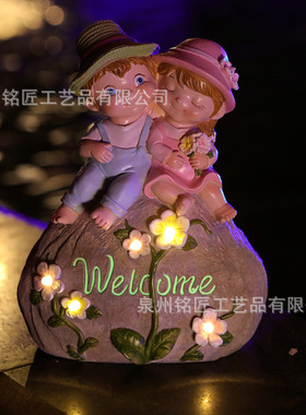户外花园男女孩情侣太阳能灯摆件庭院草坪仿真石头花朵夜光装饰品