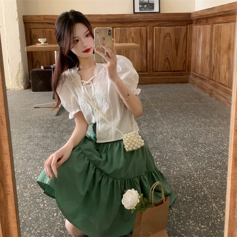 Real shot real price Korean version thin high waist cake skirt irregular swing skirt + bubble sleeve shirt