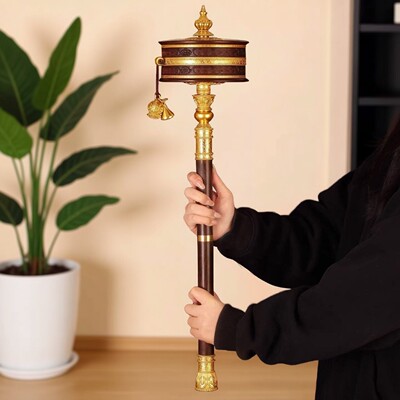 亚青si黄铜手摇转金轮檀木柄摆件