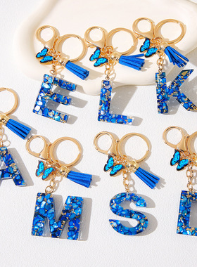 跨境热卖厂家一代发蓝色贝壳字母印花蝴蝶流苏饰品挂饰树脂