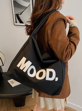 韩版时尚帆布包包女2026秋冬大容量学生购物袋简约复古休闲单肩包