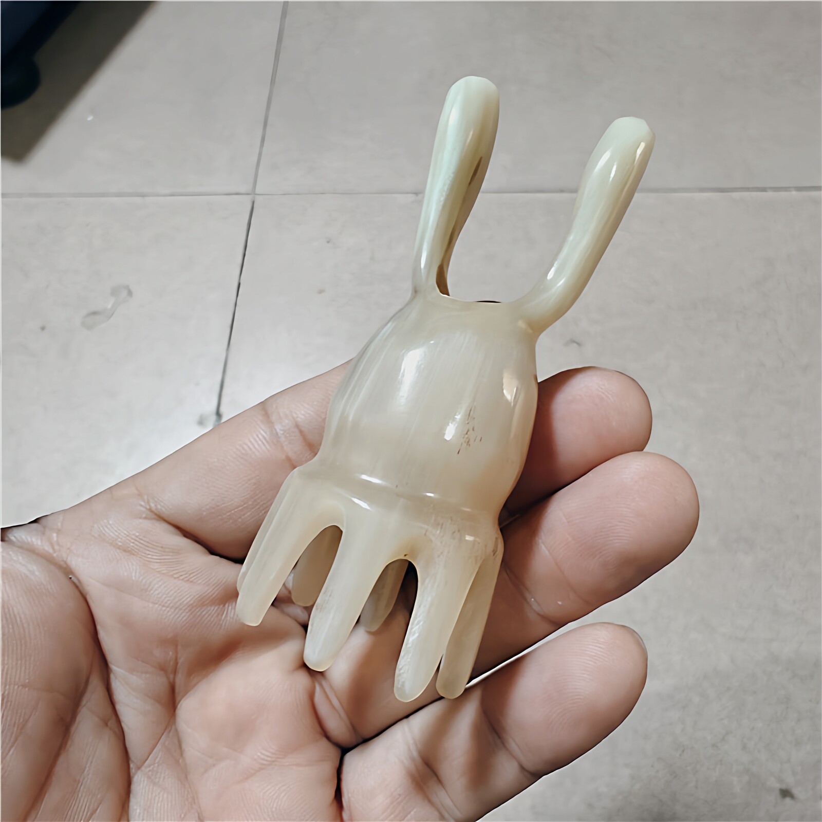 天然黄牛角兔子形鼻刮洗头刷大齿两用按摩梳抓头皮头部经络梳防脱