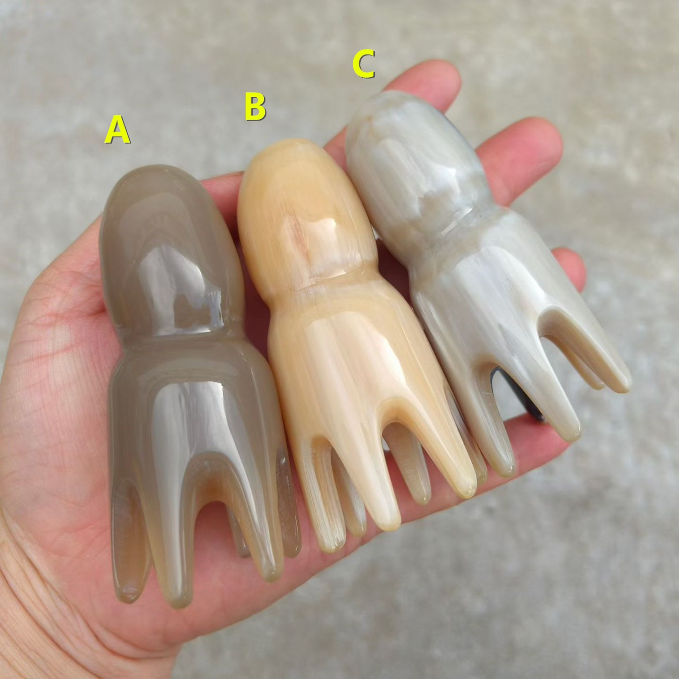 保真牛角宝塔形章鱼头按摩梳子