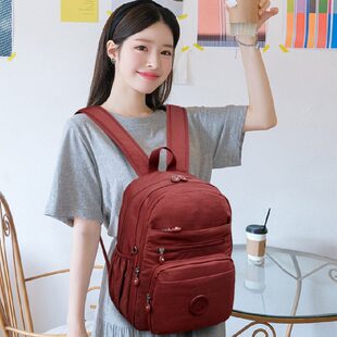 2026二层水杯位小巧轻便防泼水男女游玩双肩背平板伞杂志逛街小包