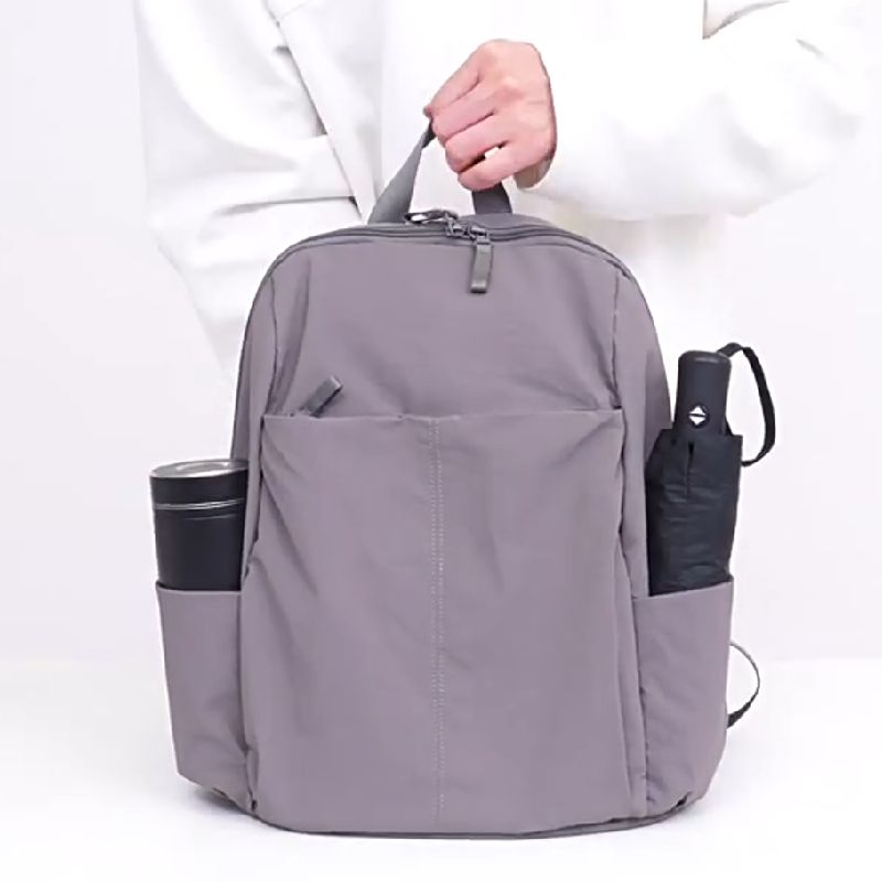 2025贝壳样水杯伞位高颜值男女式游玩双肩背减插负带大学生小书包