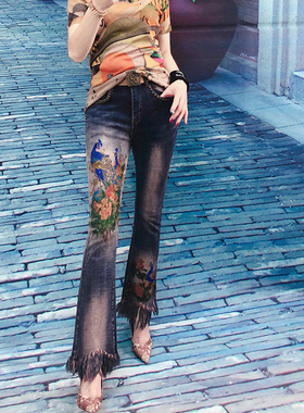 欧洲站2023时尚新款重工欧货印花烫钻孔雀图弹力喇叭牛仔长裤女潮