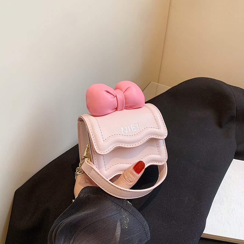 可爱蝴蝶结儿童斜挎包新款