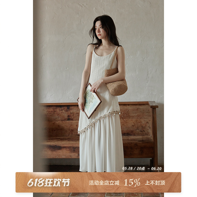 夕蒙2025新款夏韩系气质独特漂亮裙子小个子别致杏色吊带连衣裙女
