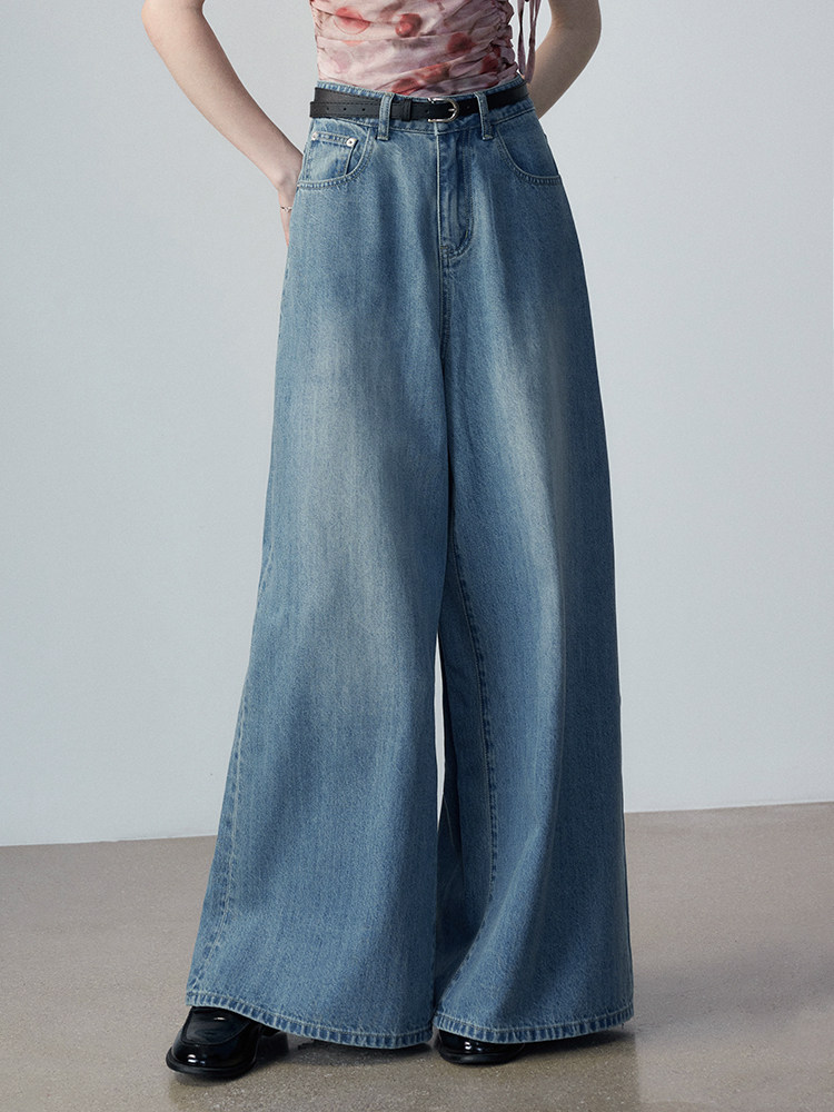 Wide-leg blue denim jeans worn by a model