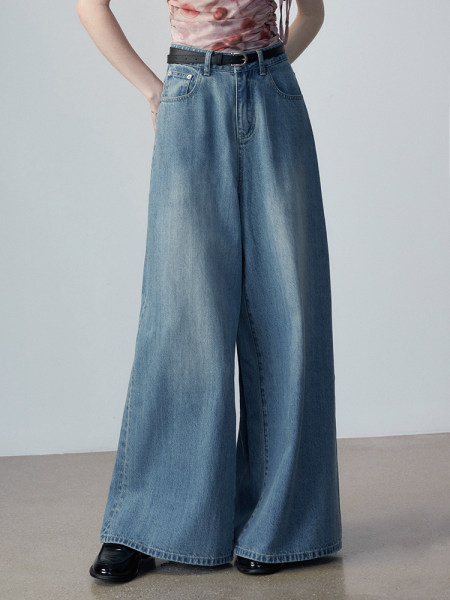 Wide-leg blue denim jeans worn by a model