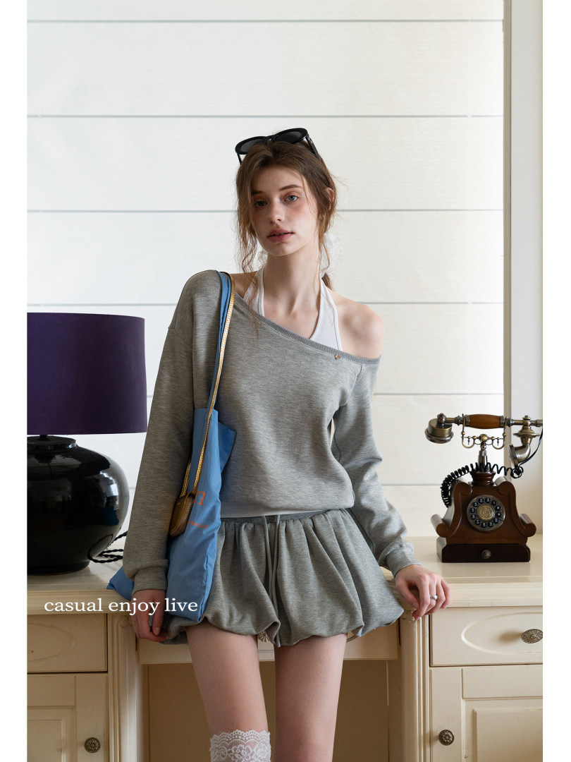Gray off-shoulder loungewear set worn by a model
