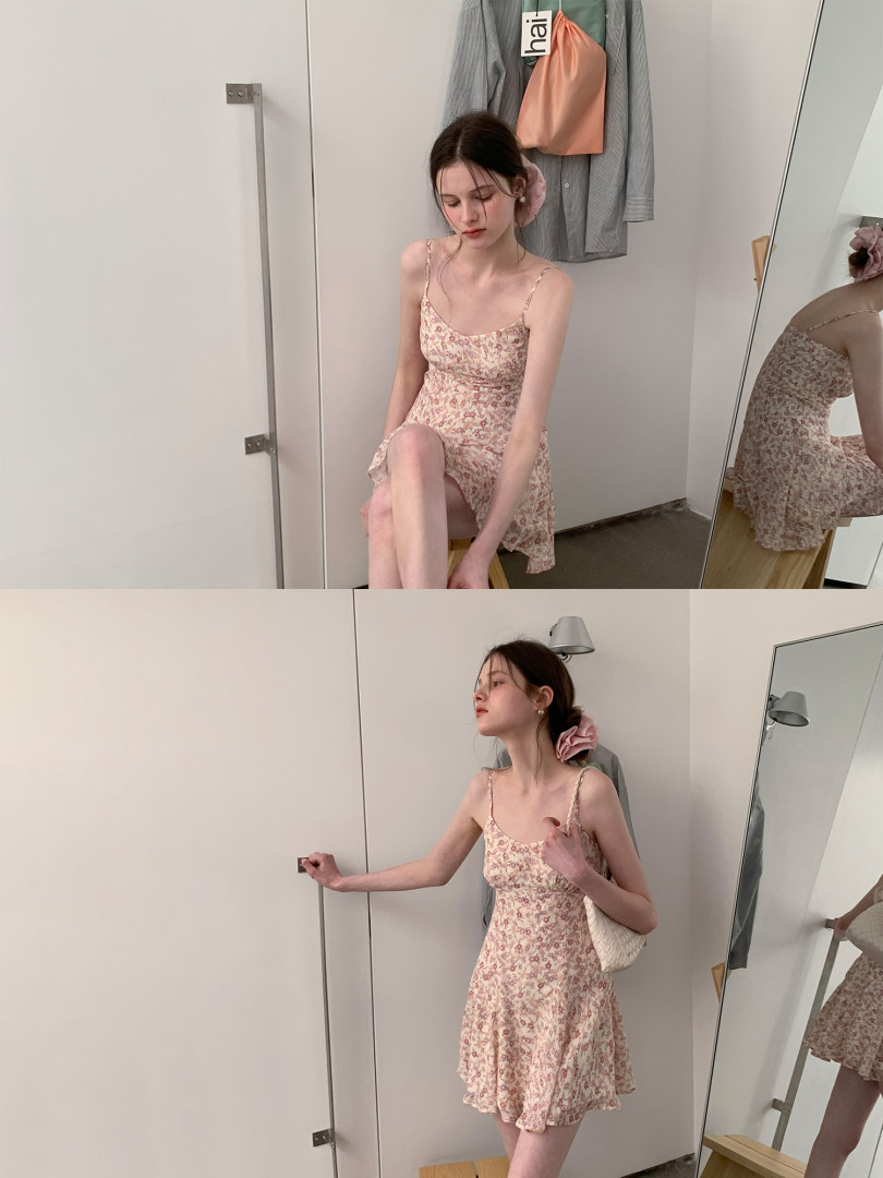 Floral spaghetti-strap mini dress worn by a model in a mirror selfie