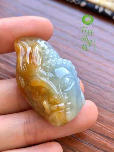 冰糯种特色黄翡佛题材