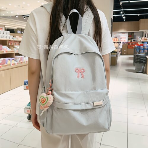 书包初中生女简约百搭蝴蝶结背包