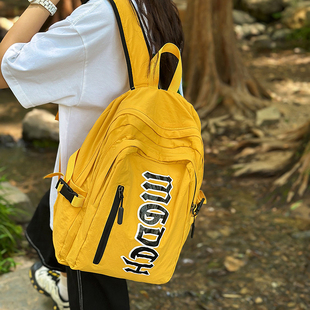 书包初中女生韩版轻便男士双肩包高级感黄色高中大学生旅行包背包