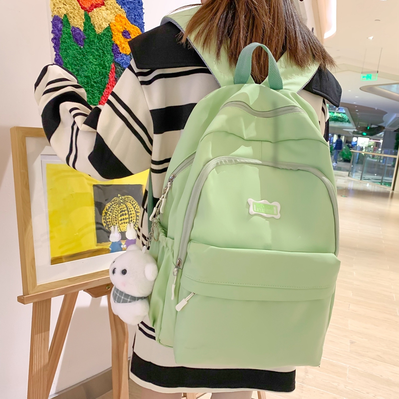 书包女生大学生韩版纯色双肩包可爱少女初中生高中背包中学大容量