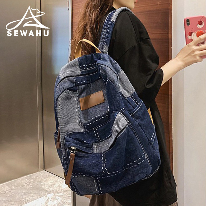小众牛仔帆布双肩包女2026新款通勤旅行背包大容量学生电脑书包男
