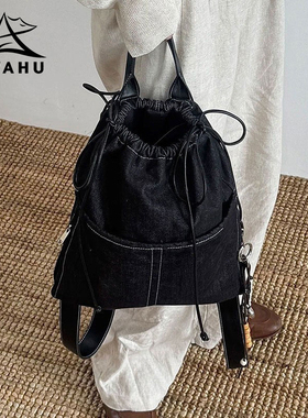 户外旅游轻便牛仔双肩包女2025新款小众时尚休闲男士通勤抽绳背包
