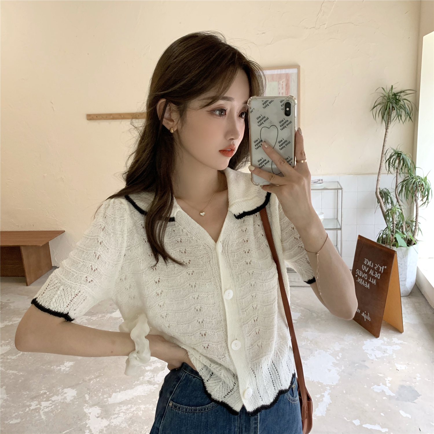 Real price ~ short Lapel knitted cardigan women's Korean white hollow texture thin top