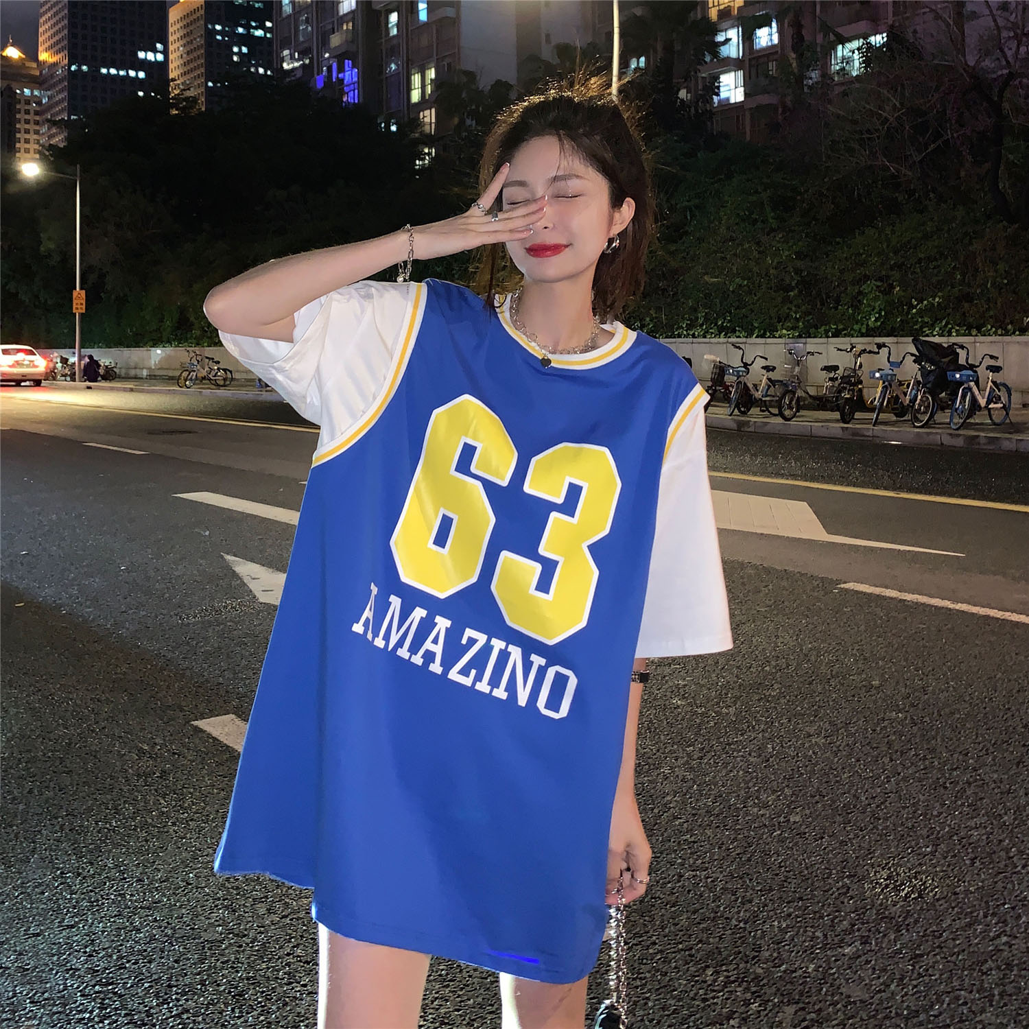 Real shot real price ~ Korean version loose BF wind vacation two pieces of basketball clothes medium length printed short sleeve t-shirt female