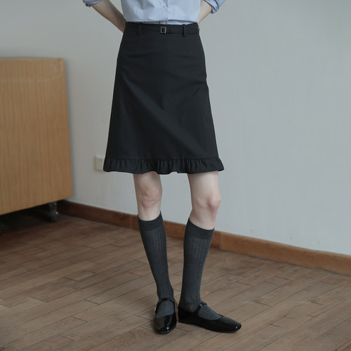 春也白 设计感下摆荷叶边A字半身裙女百搭通勤复古黑色直筒中裙秋