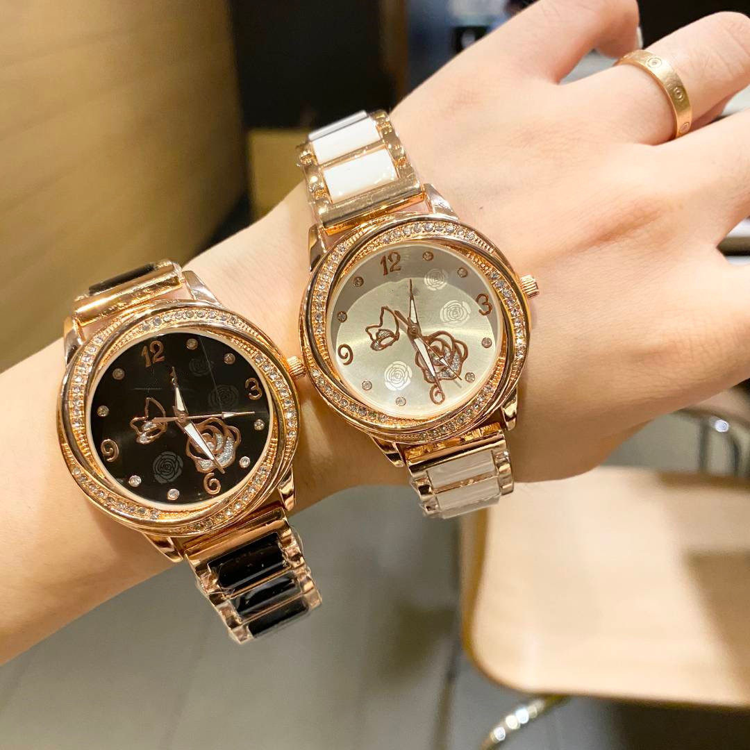 跨境新款气质黑白花朵欧家石英机芯女士镶钻表盘陶瓷手表