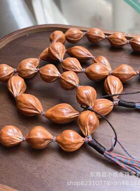 厂家直销梅林铁核流苏款橄榄核橄榄老油核文玩配饰品手持大量