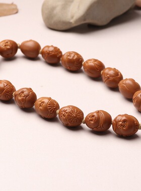 手工橄榄核雕刻小籽可爱铁核豆丁大头弥勒佛橄榄胡手串十小佛手持