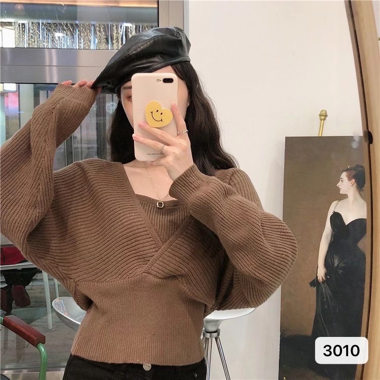 Autumn Korean design: French style small crowd closing waist showing thin and fake two piece off shoulder long sleeve knitwear