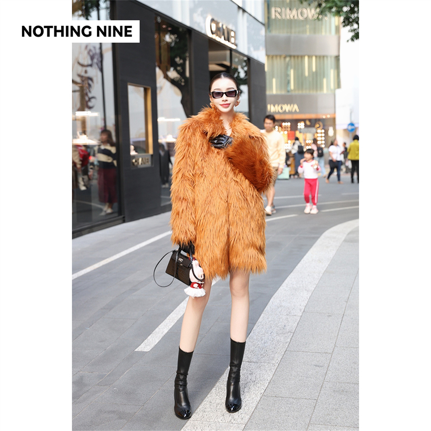 NOTHING NINE 契尔柯琥珀环保皮草夹棉外套