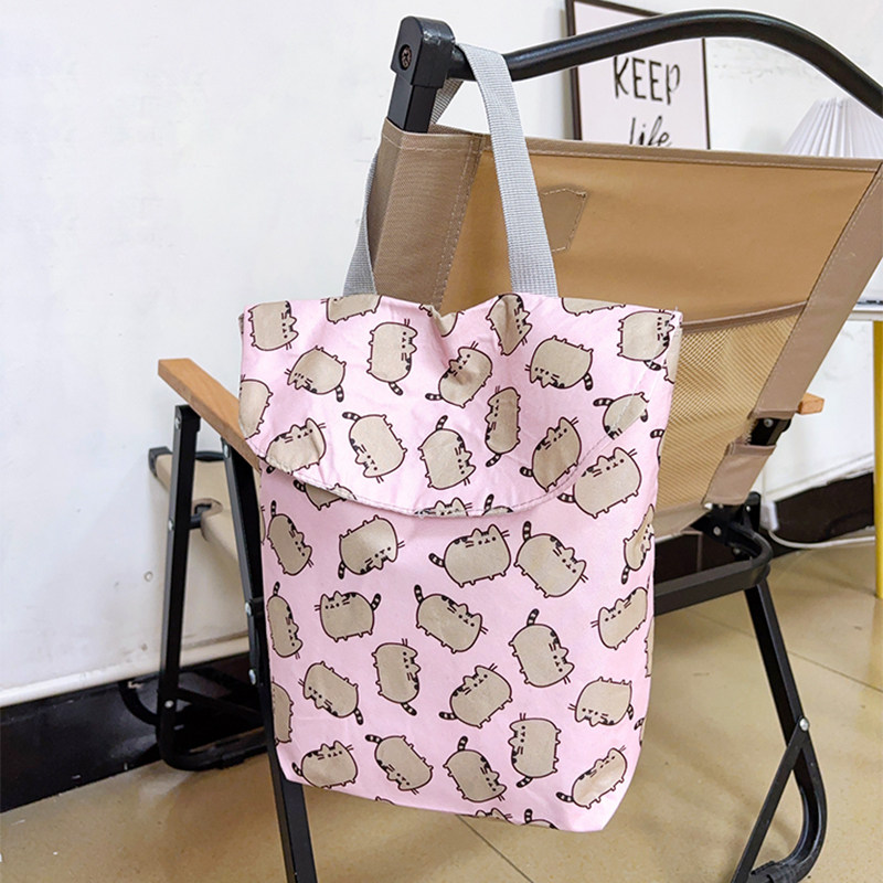 卡通可爱棉布袋魔术贴手拎袋多功能收纳袋便携外出婴儿尿布包挂袋