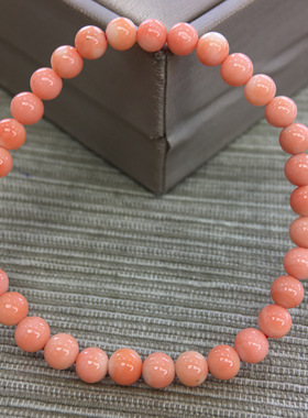 七宝珊瑚： 圆珠手串 颜色橘粉 尺寸5.0～5.5mm 重6.87克