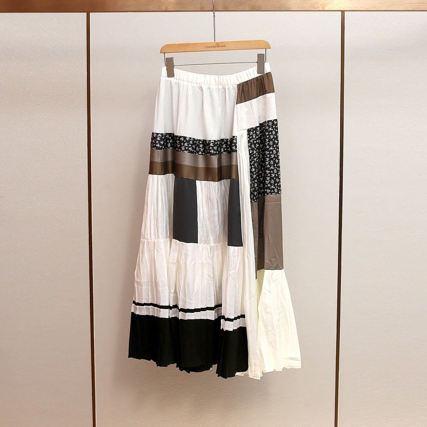 深圳南油高端女装秋冬新款法式休闲复古拼色A字压褶拼接半身裙女